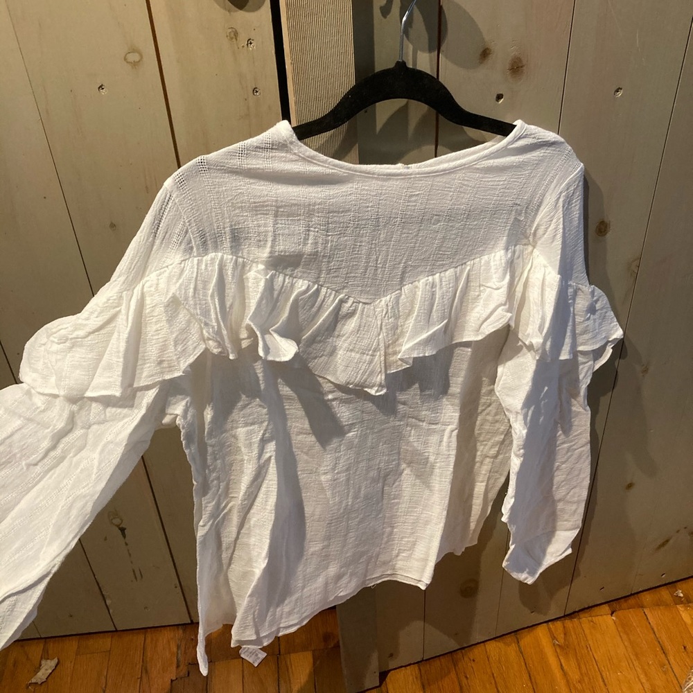 White ruffle top
